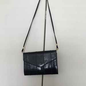 Delané  Canada Mini Crossbody Clutch